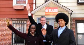 Bill de Blasio with his wife and son in front of their house in Broocklyn. 
