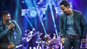 Usher and Romeo Santos.