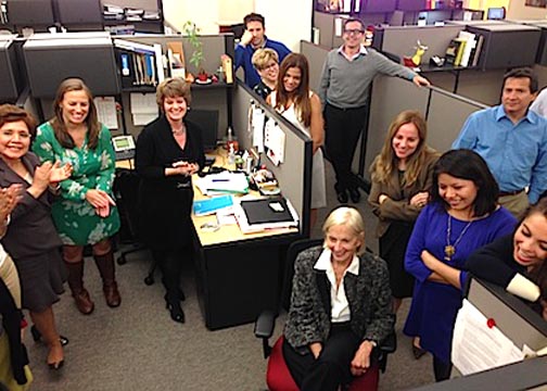 Pro Mujer's staff watching the 2013 Clinton Global Initiative announcement at their office in New York City. 
