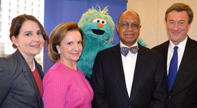 From left to right, Caroline T. Roan, Vice President of Corporate Responsibility, Pfizer Inc.; Rosario Perez,Pro Mujer's President and CEO; Rosita from Sesame Street; H. Melvin Ming, Sesame Workshop's President and CEO; John Noseworthy, M.D., Mayo Clinic's President and CEO.