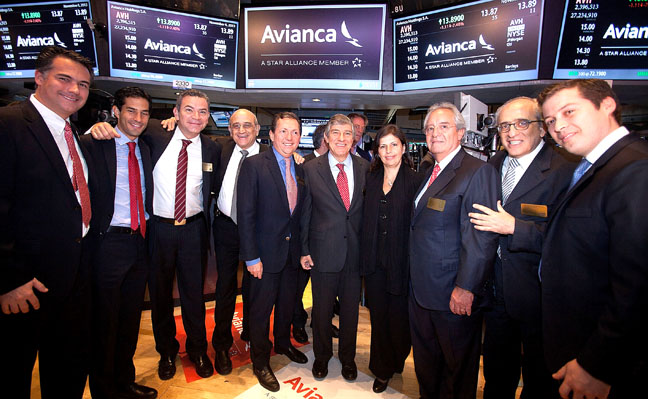 The CEO of Avianca  Fabio Villegas Ramirez ( C) celebrates their IPO at the New York Stock Exchange in New York, November 6, 2013.    Carlo Allegri/NYSE EURONEXT