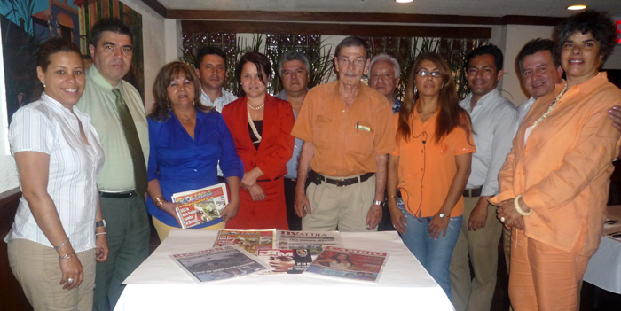 Carlos Velez in the restaurant La Pequeña Colombia of Queens with some members of the Hispanic Media Council.