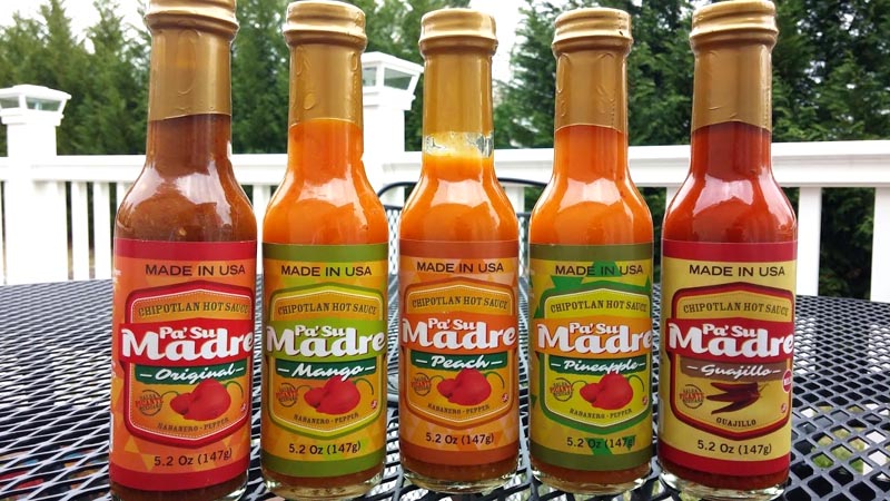 Las botellas de Pa' tu madre de diferentes colores y sabores.