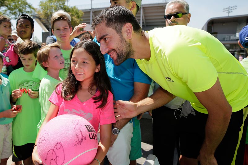 Marin Cilic, en la foto, y Christina McHale se mostraron atentos y felices de compartir con los niños de Queens. Foto USTA