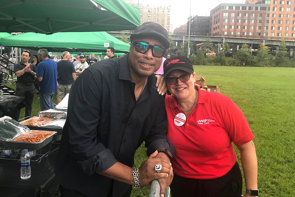 Bernie Williams, former New York Yankee and Maggie Castro, AARP New York, Associate State Director.