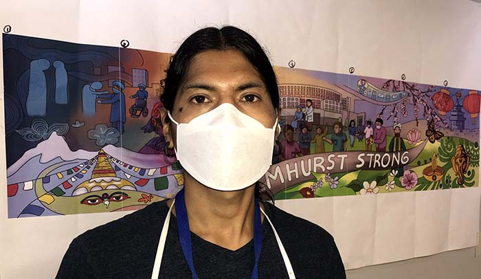 Artista andino crea mural en Elmhurst Hospital